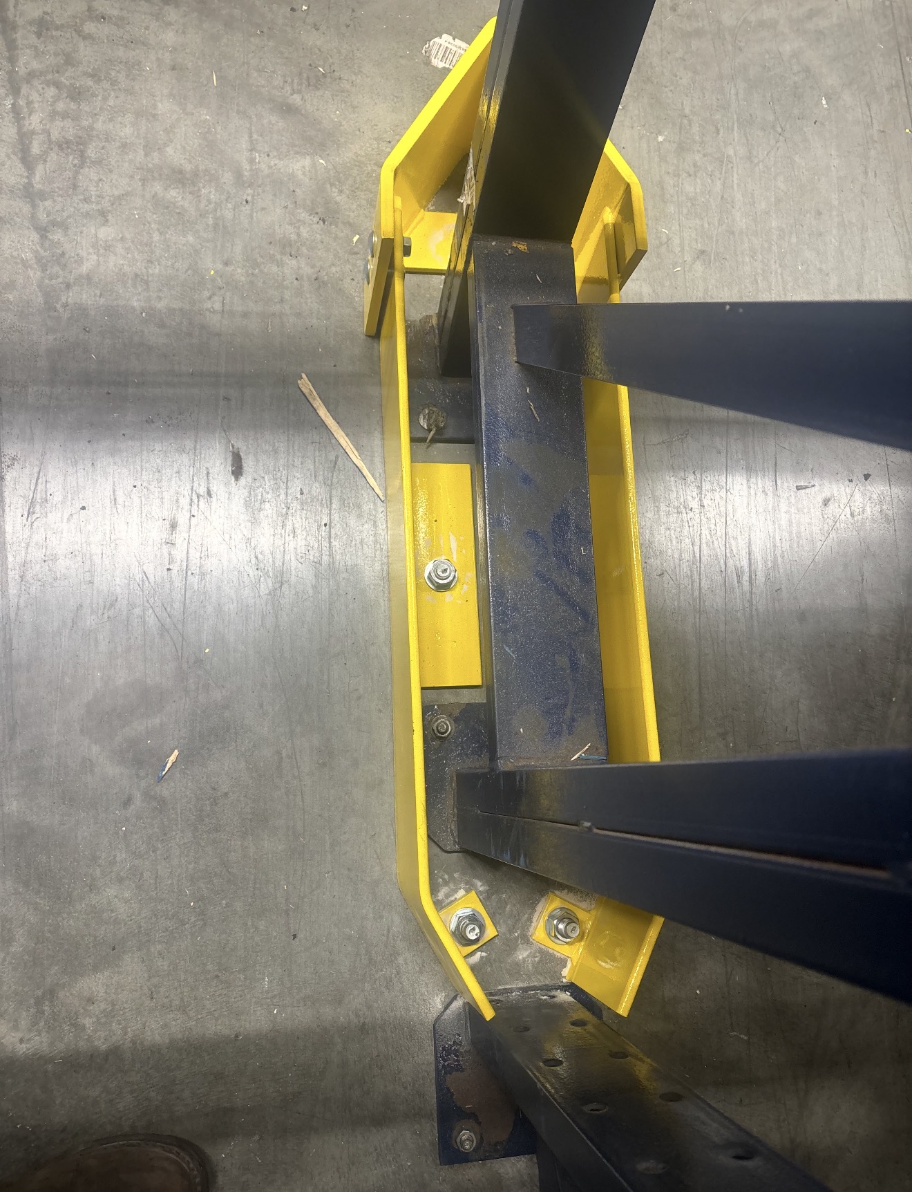 Installed Elite Rackz end-of-aisle rack guard protecting an exposed row end