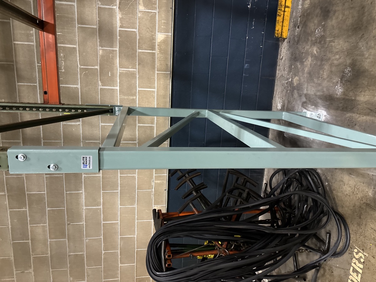 Close view of an installed green Vertical Double Leg connection
